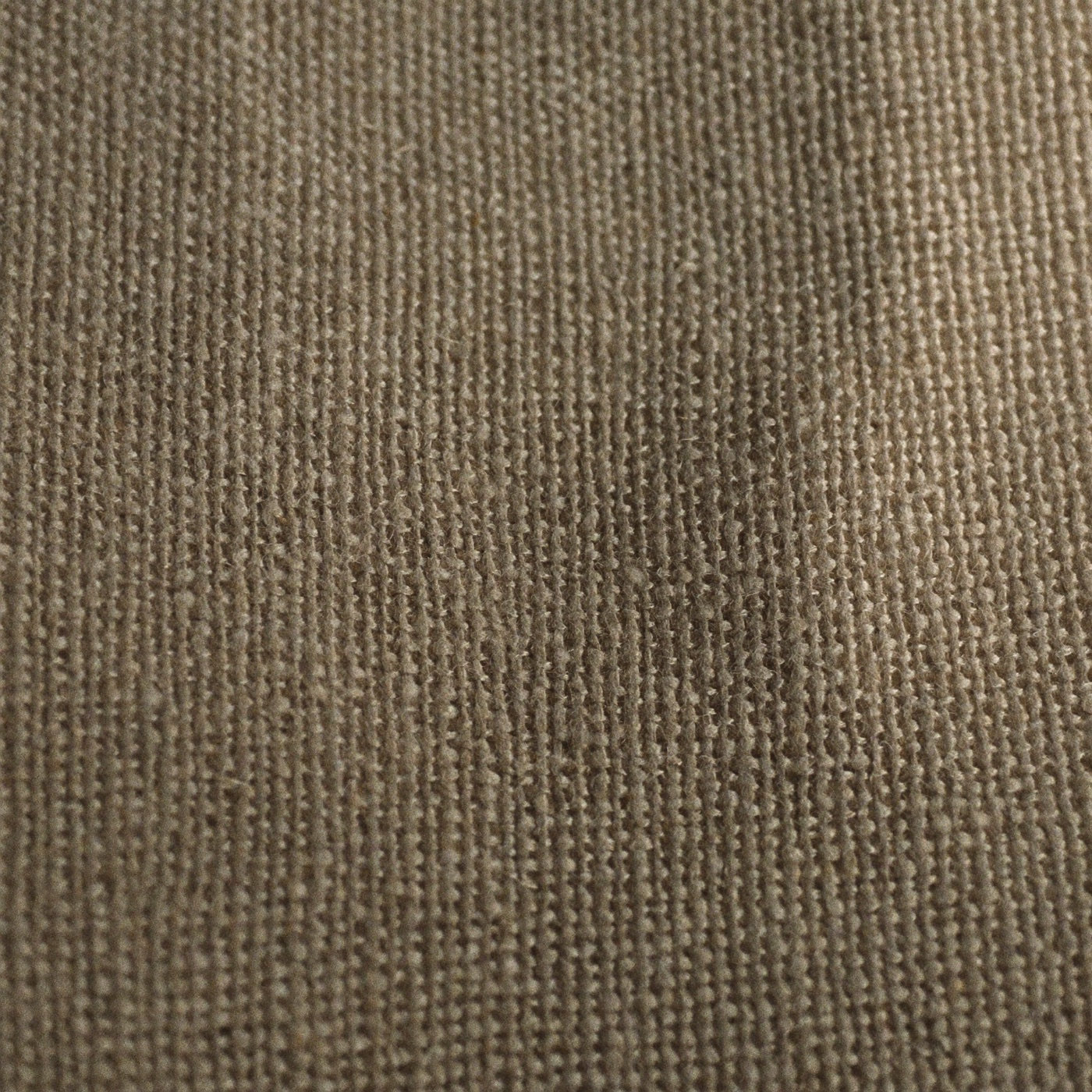Macro detail of undyed oatmeal wool and linen weave