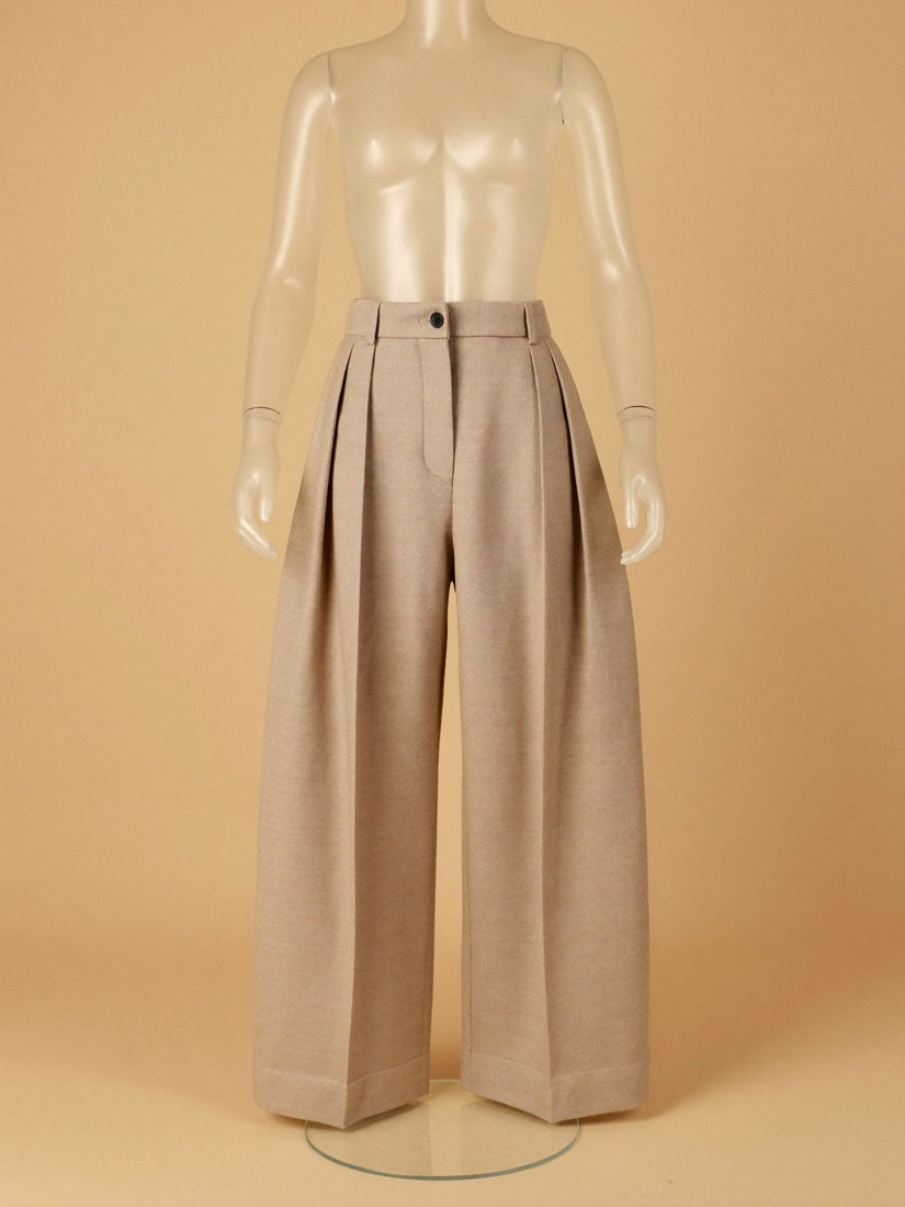 The Tailored Trouser — sand pleated wide-leg trousers
